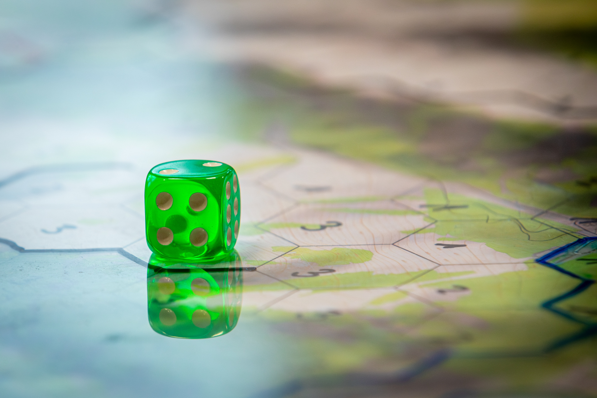 Military wargaming activity with participants examining tactical decisions